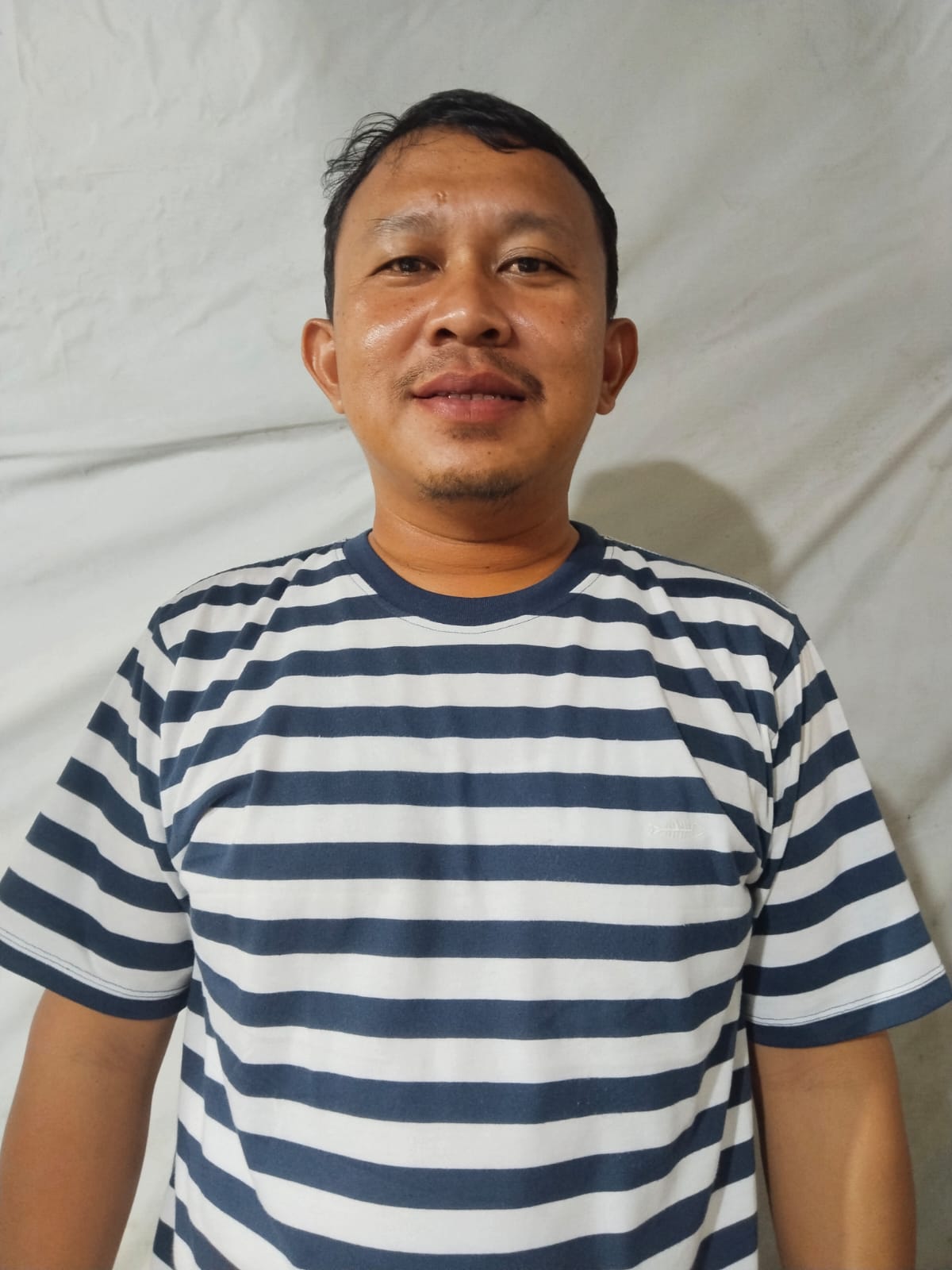 Hendry Tio